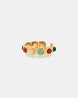 Anillo acero dorado con piedras de colores.