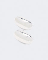 Pendientes en acero plateado con forma de óvalo.